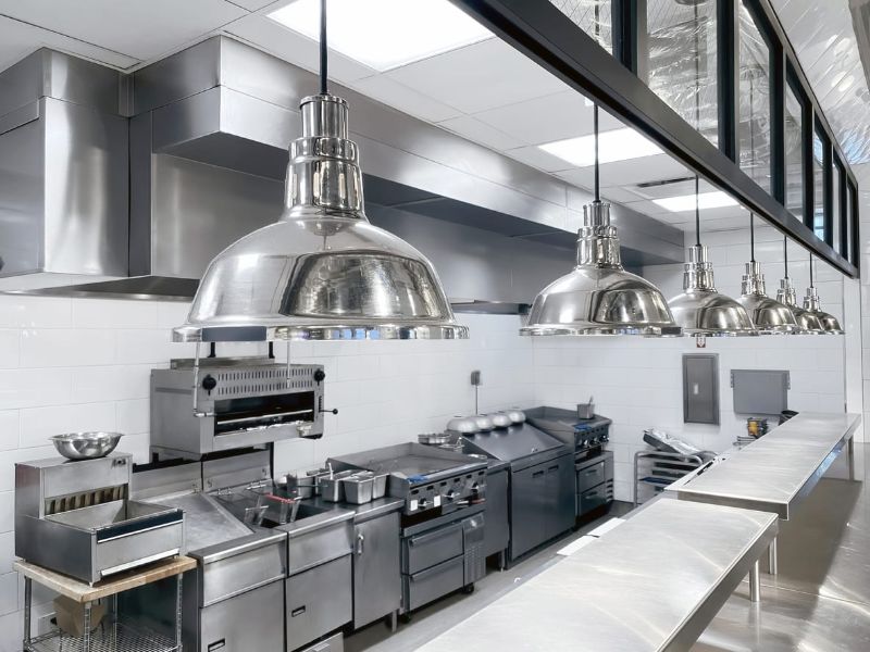Stainless steel and appliances in clean kitchen by Rose Pest Solutions