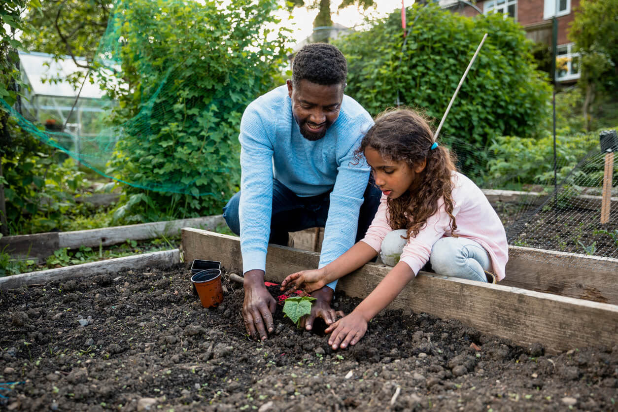 Father Daughter Planting