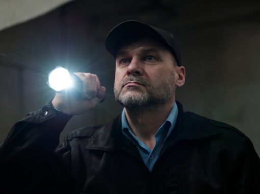 technician holding flashlight