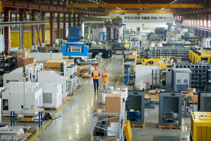 Employees walking across a manufacturing facility in Chicago, IL