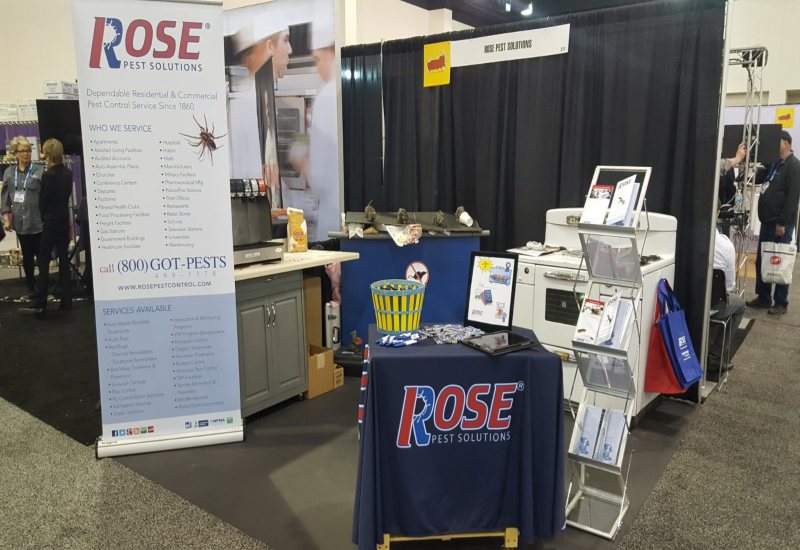Rose Pest Solution booth at the 2018 San Diego International Trade Show, showcasing pest control solutions.